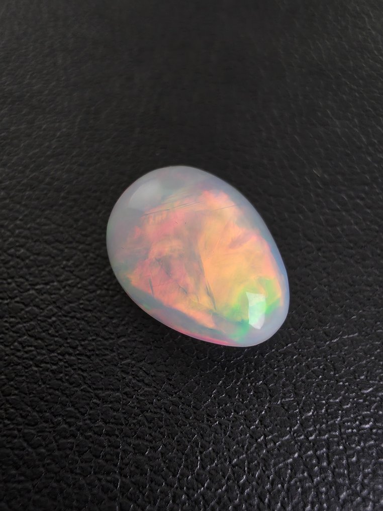 3,22 ct Opal natural Caboșon - Înălțime: 12.5 mm - Lățime: 9.8 mm- 0.64 g #1.0