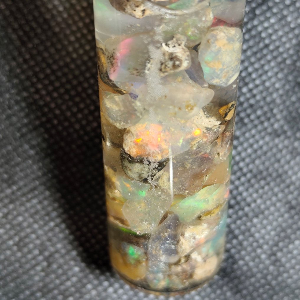 70 carats of Welo opal rough and pre-polished stones. Rough- 14 g - (1) #1.0