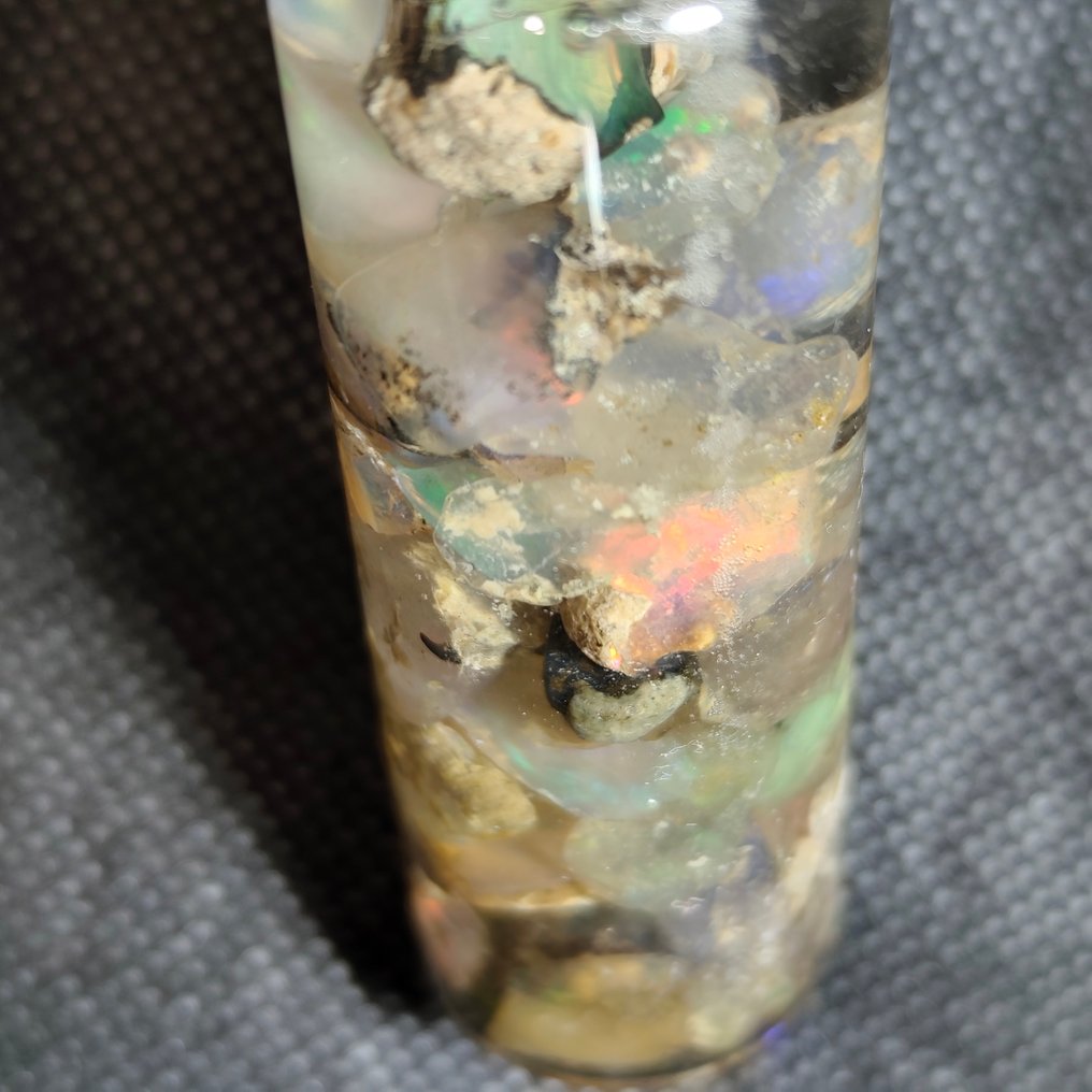 70 carats of Welo opal rough and pre-polished stones. Rough- 14 g - (1) #4.3