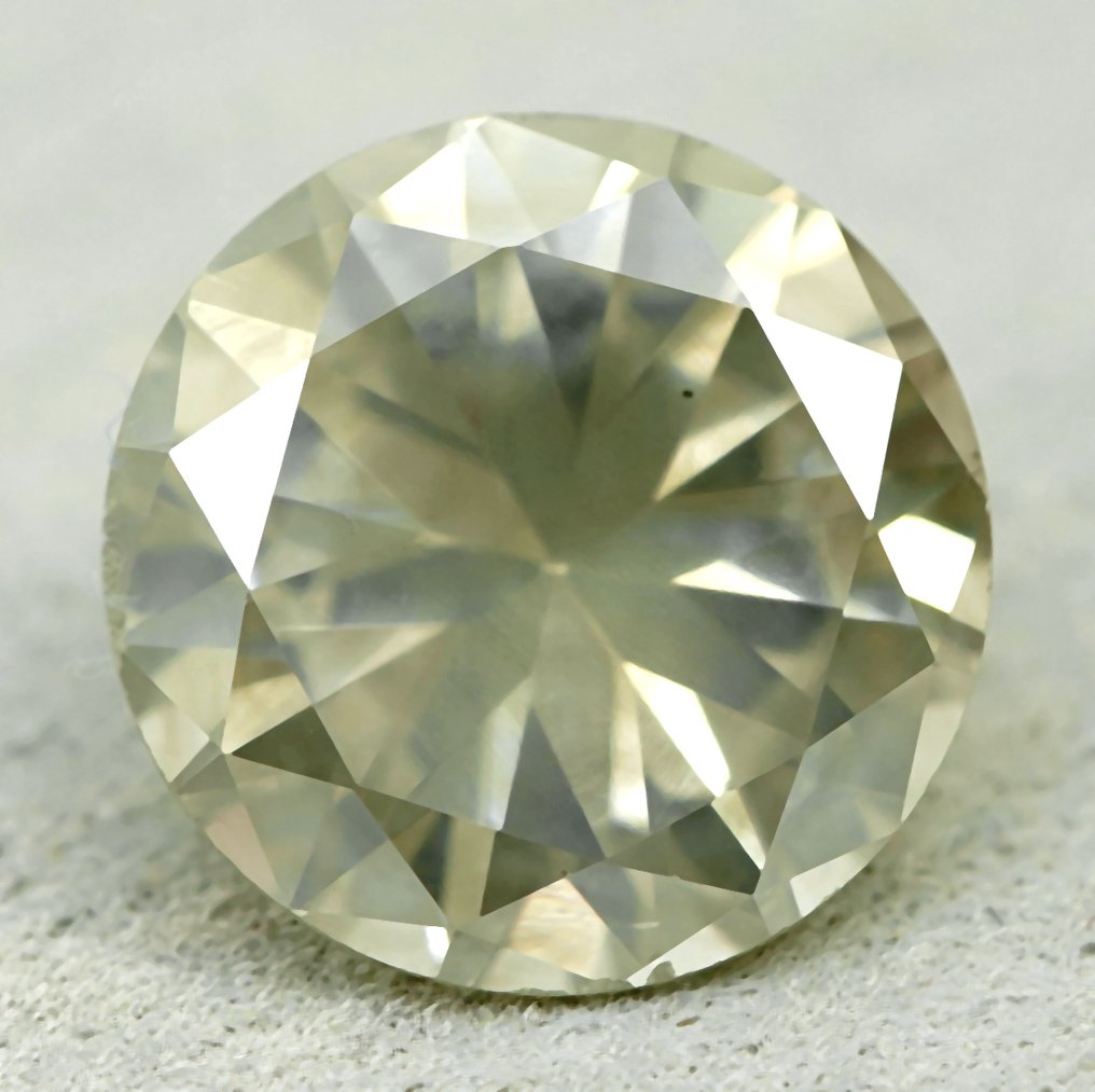 1 pcs Diamant (Naturfarvet) - 1.07 ct - Rund - Faint Gullig Grå - I1 - Gem Report Antwerp (GRA) #1.0