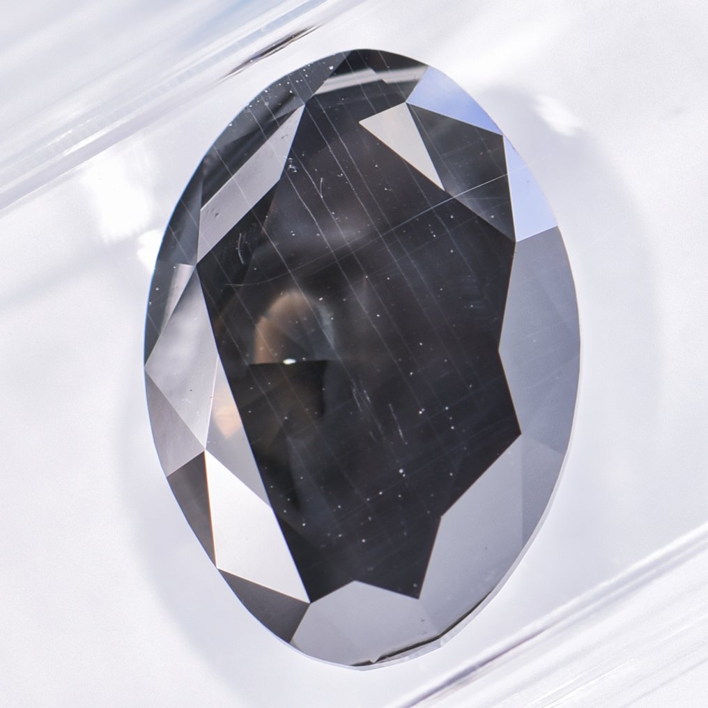 Fără preț de rezervă - 1 pcs Diamant  (Colorat natural)  - 5.06 ct - Oval - Fancy dark verzui Gri - I1 - IGI (Institutul gemologic internațional) - VG #4.3