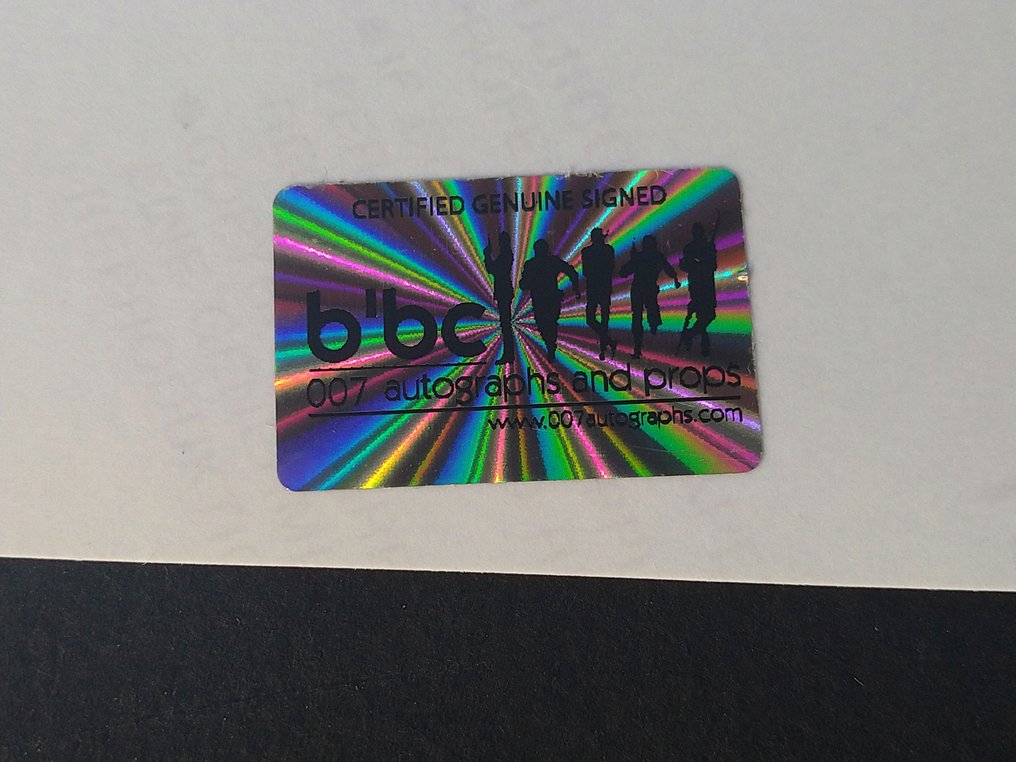 James Bond 007: GoldenEye - Pierce Brosnan with Aston Martin DB5- Signed photo with COA #3.2