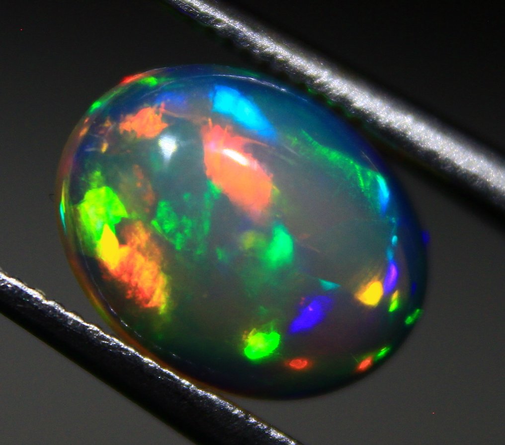 Ct. 5.10 天然埃塞俄比亚欧泊 弧面形 - 高度: 9 mm - 闊度: 7 mm- 1.02 g - (4) #2.1