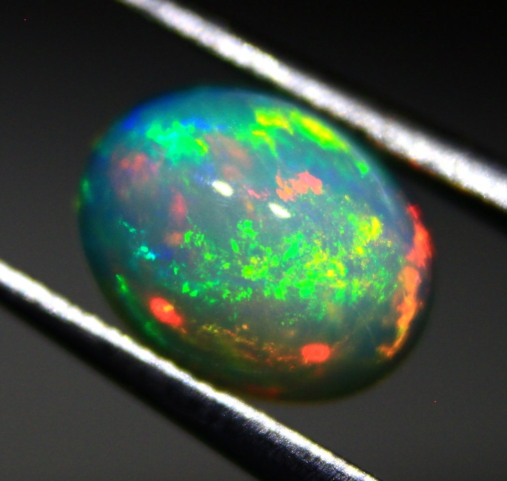 Ct. 5.10 天然埃塞俄比亚欧泊 弧面形 - 高度: 9 mm - 闊度: 7 mm- 1.02 g - (4) #4.3