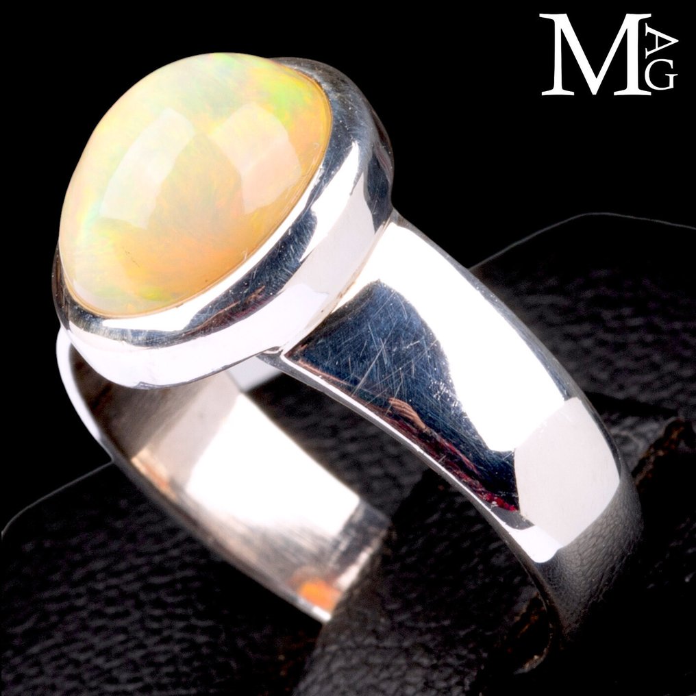 Κίτρινο Πράσινες Αντανακλάσεις και Πορτοκαλί Φλέβες. Δαχτυλίδι με αιθιοπικό Welo Opal. - Ύψος: 25.2 mm - Πλάτος: 20 mm- 5 g #4.3