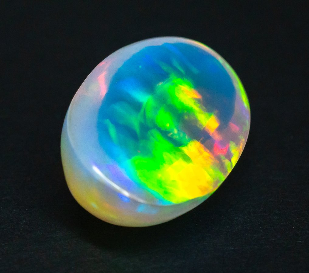 Bez ceny minimalnej
 Opal  - 25.11 ct - Raport gemmologiczny Antwerpia (GRA) - Biały 'Play of Colors' #1.0