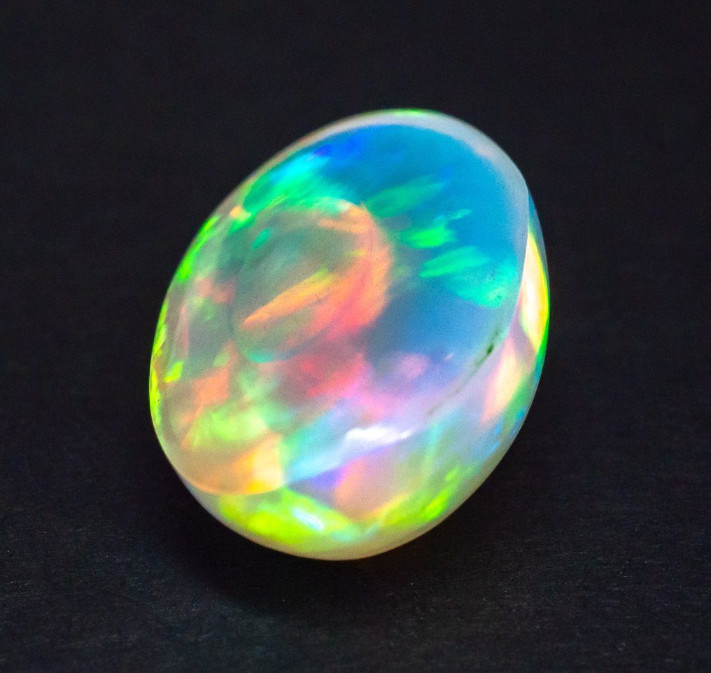 Bez ceny minimalnej
 Opal  - 25.11 ct - Raport gemmologiczny Antwerpia (GRA) - Biały 'Play of Colors' #2.1