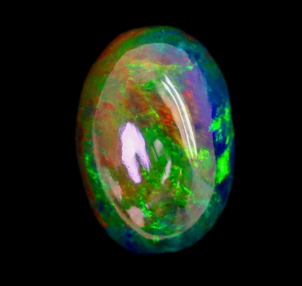 一颗一流的 AAA+++ 欧泊蛋面，重2.65克拉 磨光 - 高度: 12 mm - 闊度: 8 mm- 0.53 g - (1) #1.0