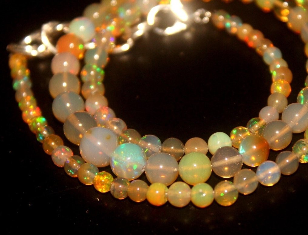 Natural Opals Sphere 51,6 snt- 10.32 g #1.0