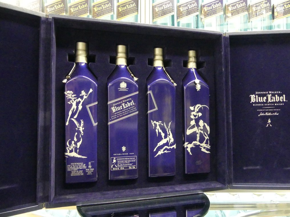Johnnie Walker Blue Label - Celebrating Year of the Ram Limited Edition with Suitcase from China  - b. 2014  - 750ml - 4 bottles #1.0