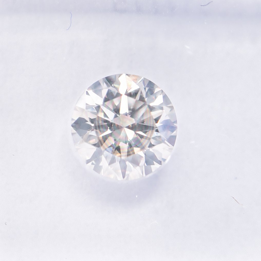 没有保留价 - 1 pcs 钻石  (天然色彩的)  - 0.70 ct - 圆形 - Light 黄色 - SI1 微内含一级 - 国际宝石研究院（IGI） - VG VG VG #1.0