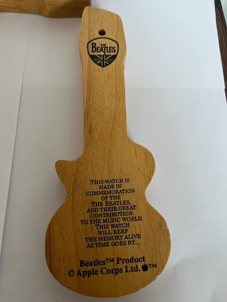 Beatles - Set of four Beatles watches in guitar-shaped wooden cases. #4.3