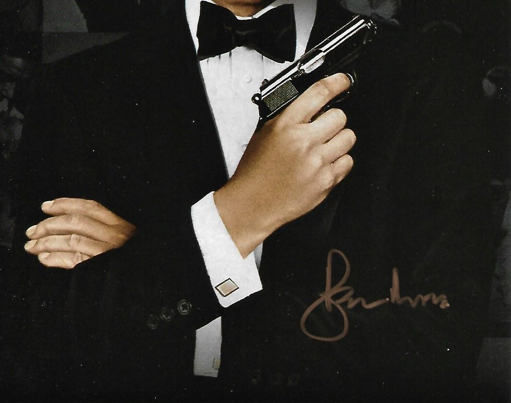 Roger Moore - Autographed Photo "The Spy Who Loved Me" James Bond 007 with b'bc COA. #2.1