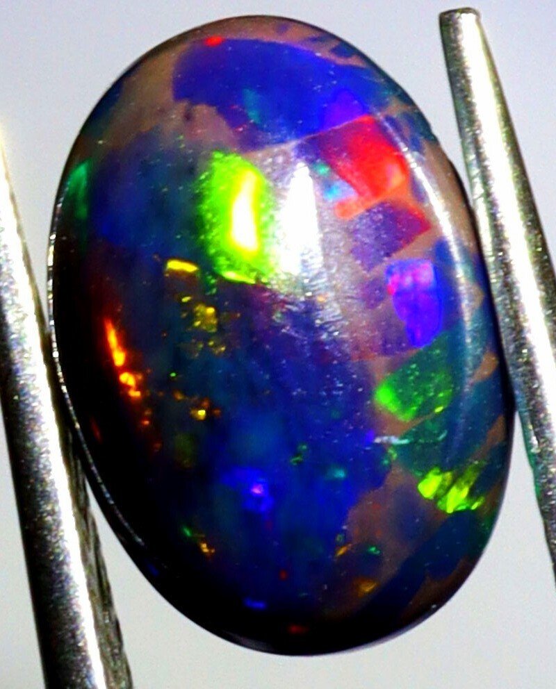 Genuine Black Opal with multicolored flashes - 1,86 ct. - No Reserve - Polished- 0.37 g #2.1