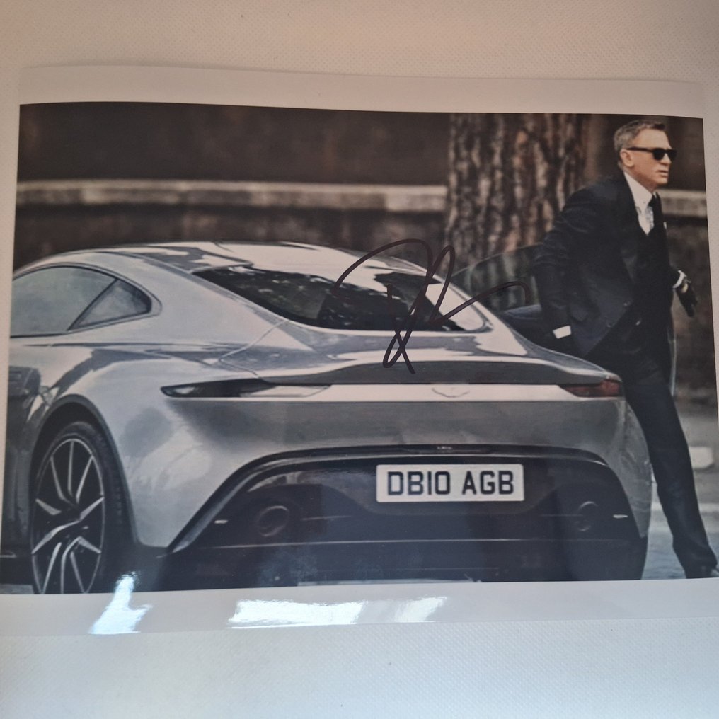 James Bond 007: Skyfall - Daniel Craig as 007 - with his Aston Martin DB10 - rare shot - signed photo with bbc holographic COA #1.0