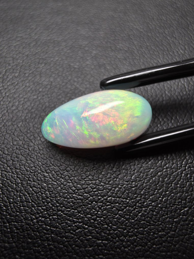 Opale naturale da 4,74 ct Cabochon - Altezza: 16.2 mm - Larghezza: 8.2 mm- 0.95 g #1.0