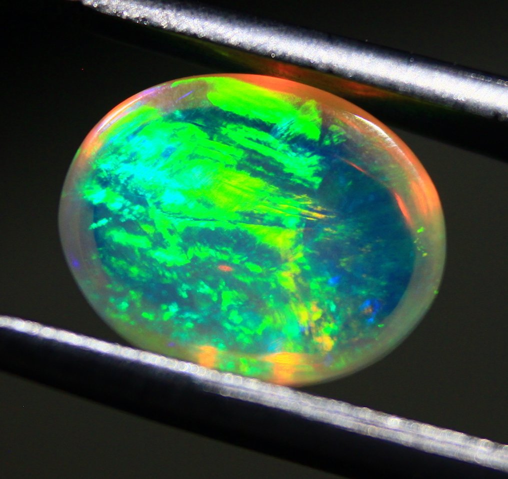 免运费 6.70 克拉 天然埃塞俄比亚蛋白石 弧面形- 1.34 g #3.2