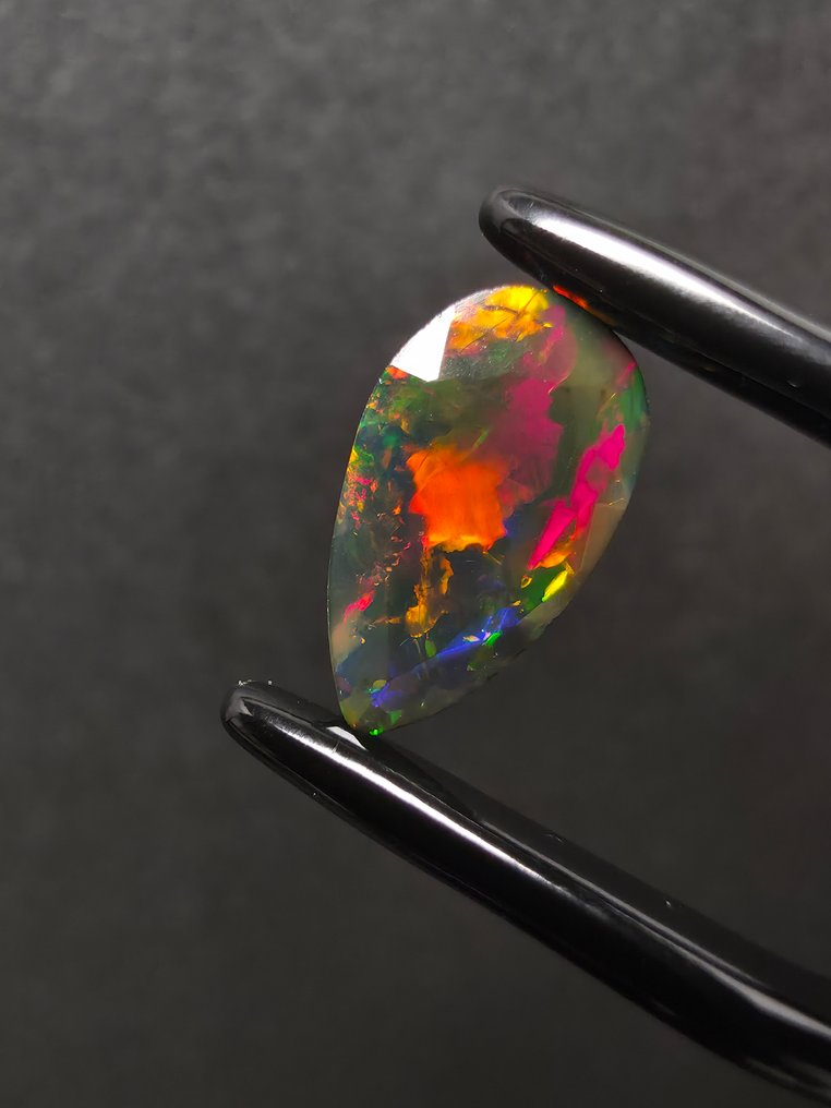 2.83 tcw Black Opal Faceted- 0.57 g - (2) #1.0