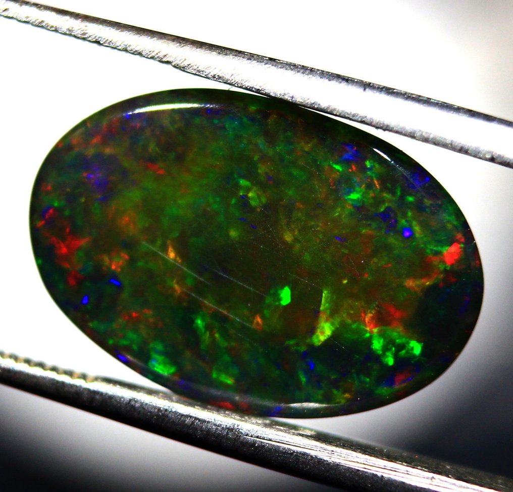 4.70 carats Natural Ethiopian Black Opal Cabochon - Height: 15 mm - Width: 10 mm- 0.94 g #3.2