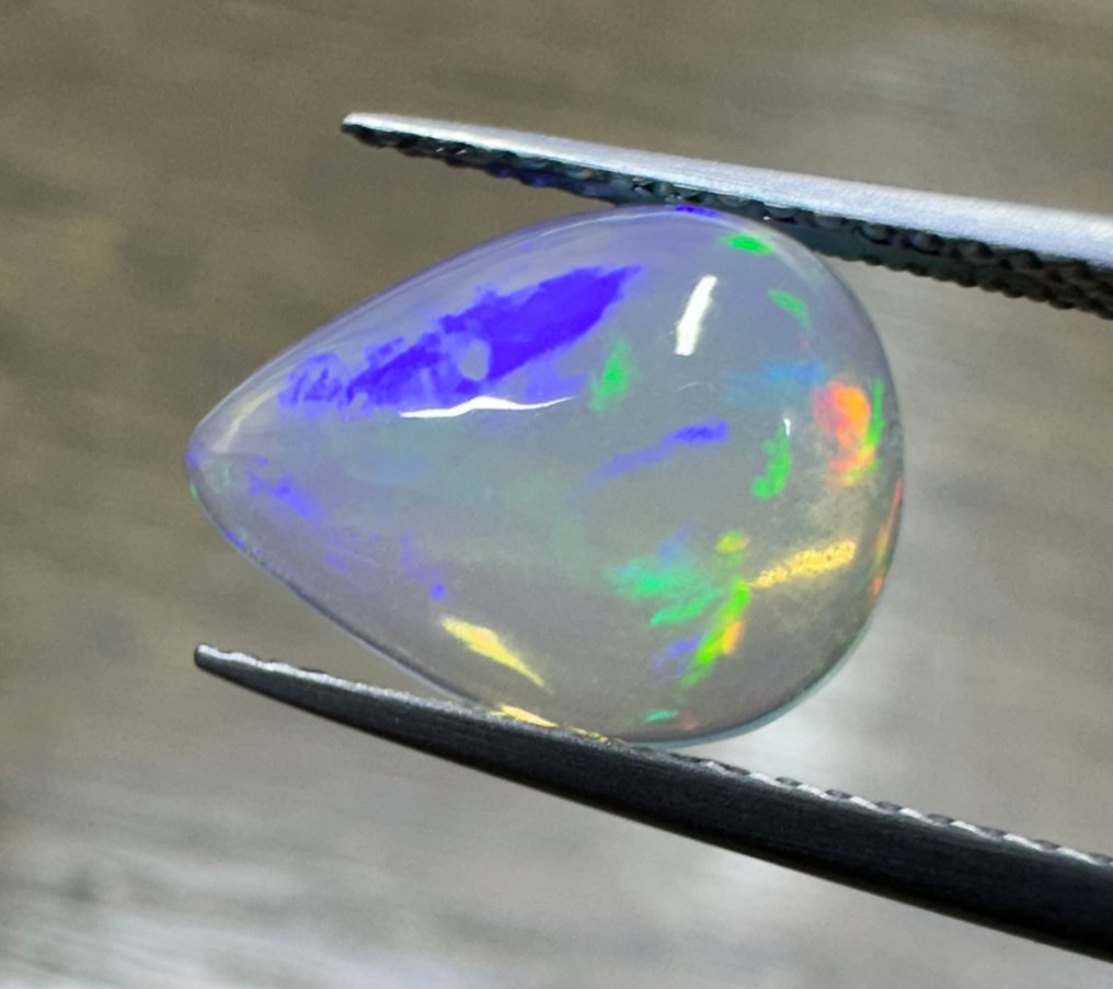 2.56ct opal Cabochon- 0.51 g #1.0