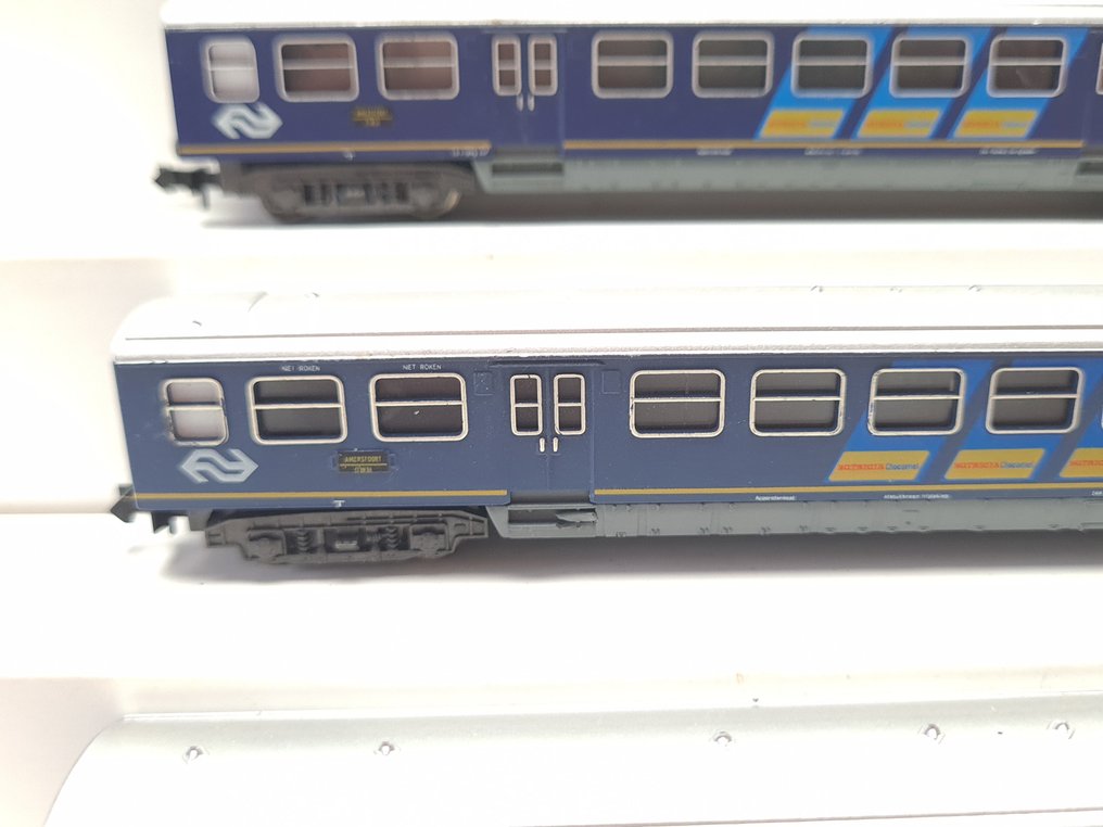 Minitrix N - 13120/13121 - Model train (4) - 4x Plan E carriages with advertising banners 'Nutricia Chocomel'. - NS #4.3