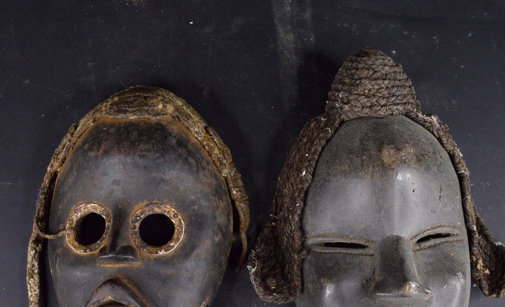 Par af løbe- og dansemasker. - Dan - Elfenbenskysten #1.0