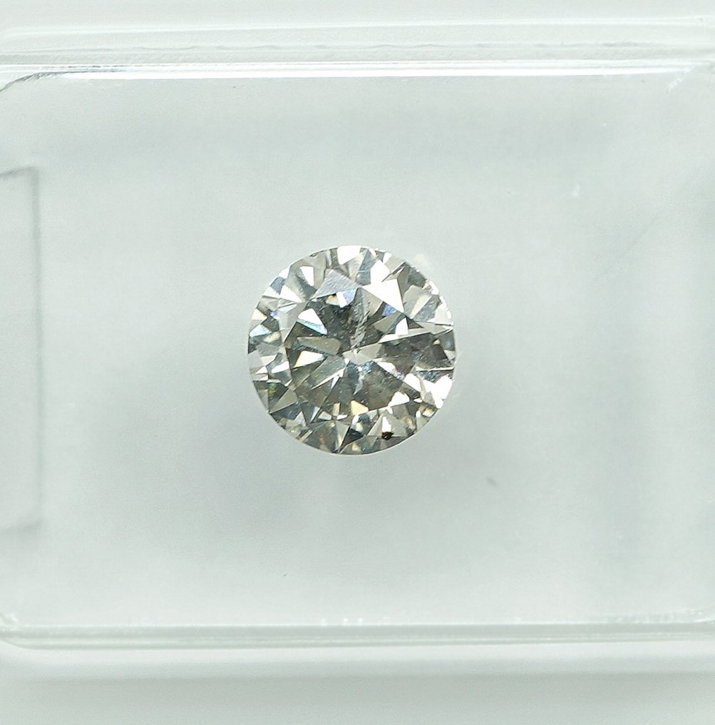 1 pcs 鑽石  (天然)  - 0.71 ct - 圓形 - J(極微黃、從正面看是亮白色) - I1 - Gem Report Antwerp (GRA) #2.1
