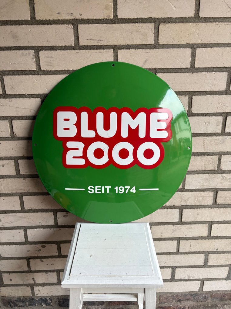 Emaljreklamskylt - Rond emaille bord – Blume 2000 – Groene huisstijl – Sinds 1974 – Duits reclamebord – Ca. 2000 - Emaljskylt - Emalj #1.0