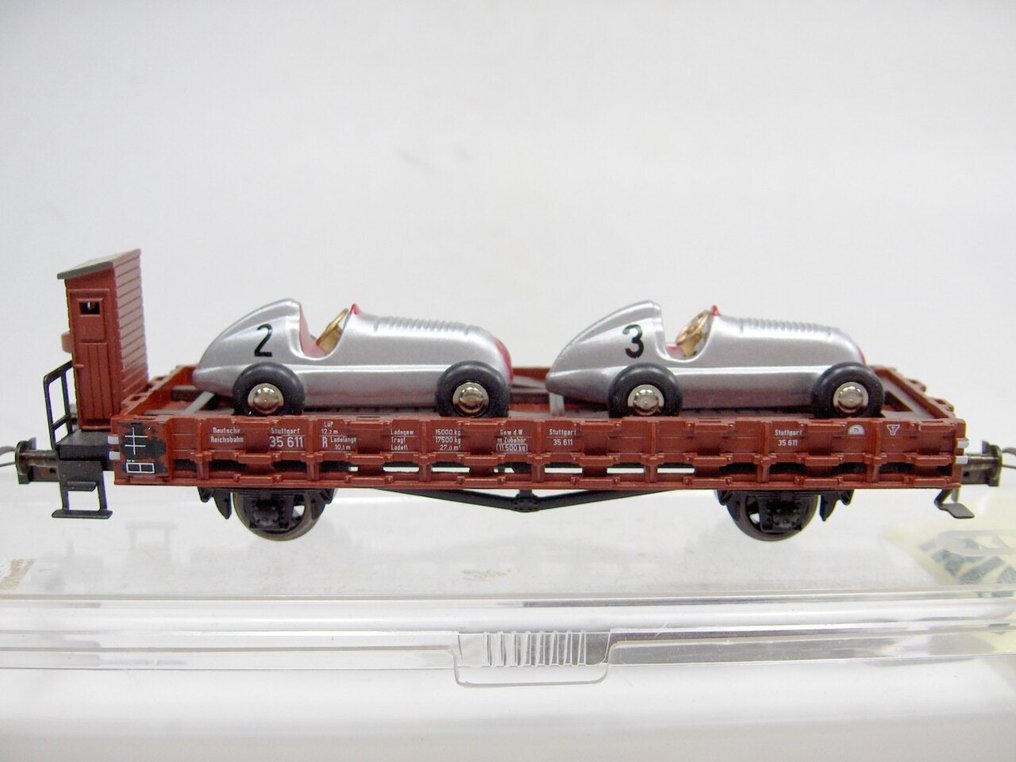 Trix International H0 - 23879 - Carrozza merci di modellini di treni (1) - Carrello con sopra 2 auto Schuco - DR (DRB) #4.3