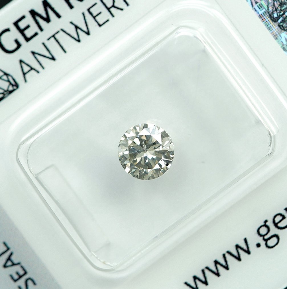 1 pcs 鑽石  (天然)  - 0.71 ct - 圓形 - J(極微黃、從正面看是亮白色) - I1 - Gem Report Antwerp (GRA) #1.0