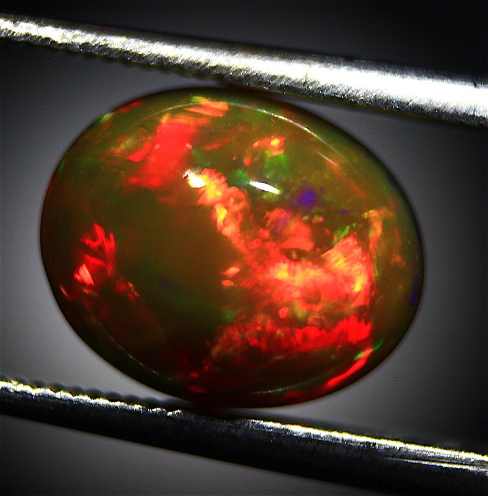 1.90 Carats Natural Dark Ethiopian Opal Cabochon - Height: 10 mm - Width: 8 mm- 0.38 g #1.0