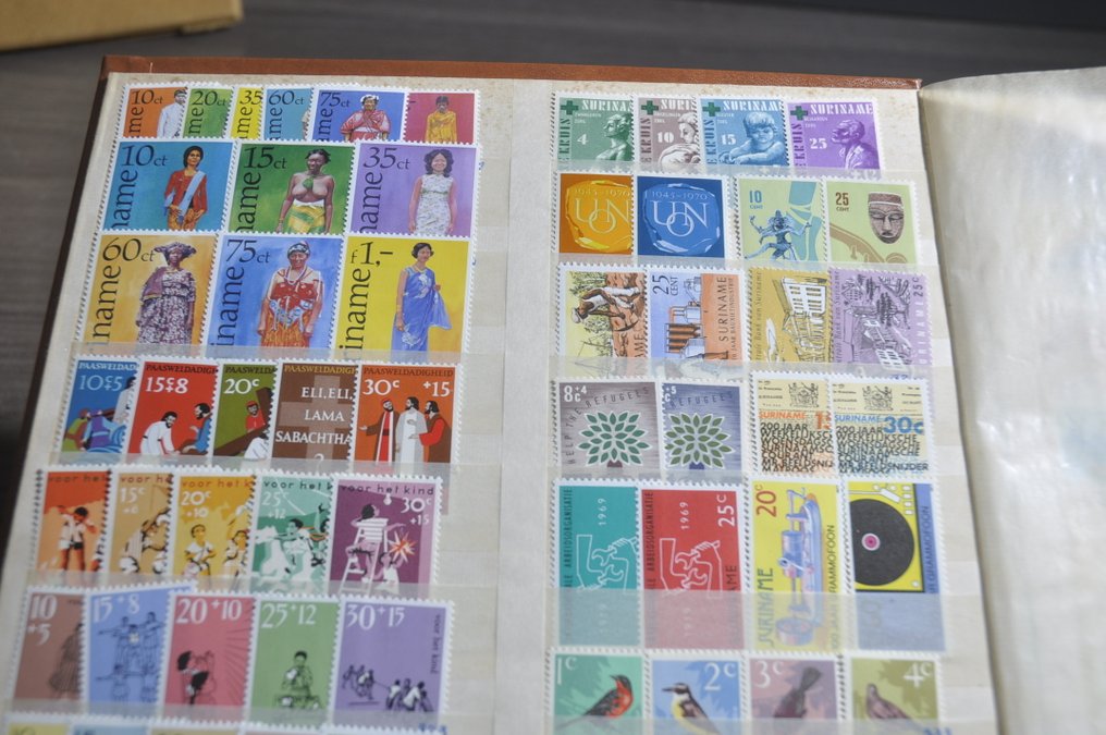 Suriname  - Most mint collection with quantities in an Album, stockbooks, and album pages (201 photos). #4.3