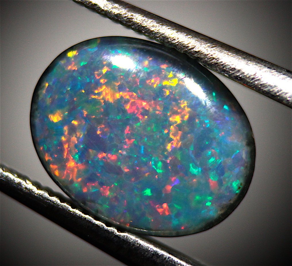 1.30克拉高品质澳大利亚欧泊三重 弧面形 - 高度: 9 mm - 宽度: 7 mm- 0.26 g #1.0