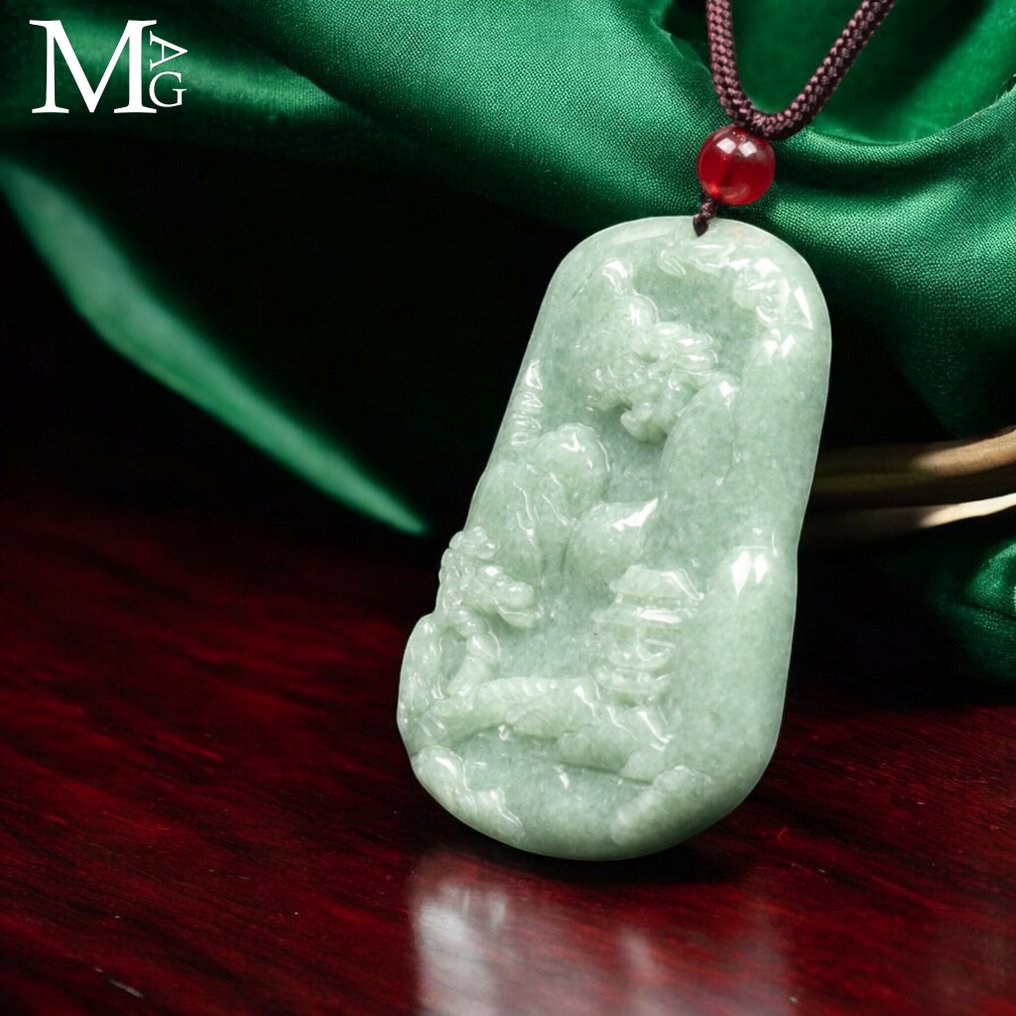 Ion d'olo in jade nephrite – Carved landscape scene in relief - Height: 52 mm - Width: 35 mm- 25 g #2.1