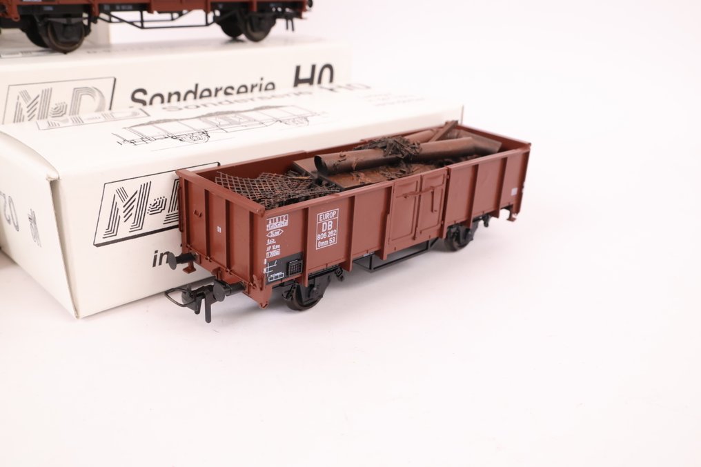 M+D Modell H0 - 046 - 模型貨運火車組合 (1) - 四辆敞篷货车装载着废金属。 - DB #3.2