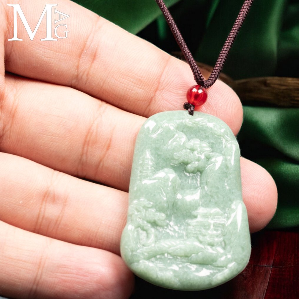 Ion d'olo in jade nephrite – Carved landscape scene in relief - Height: 52 mm - Width: 35 mm- 25 g #4.3