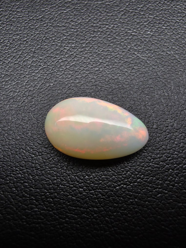 4,2 ct vit opal Cabochon - Höjd: 15.2 mm - Bredd: 9.3 mm- 0.84 g #2.1
