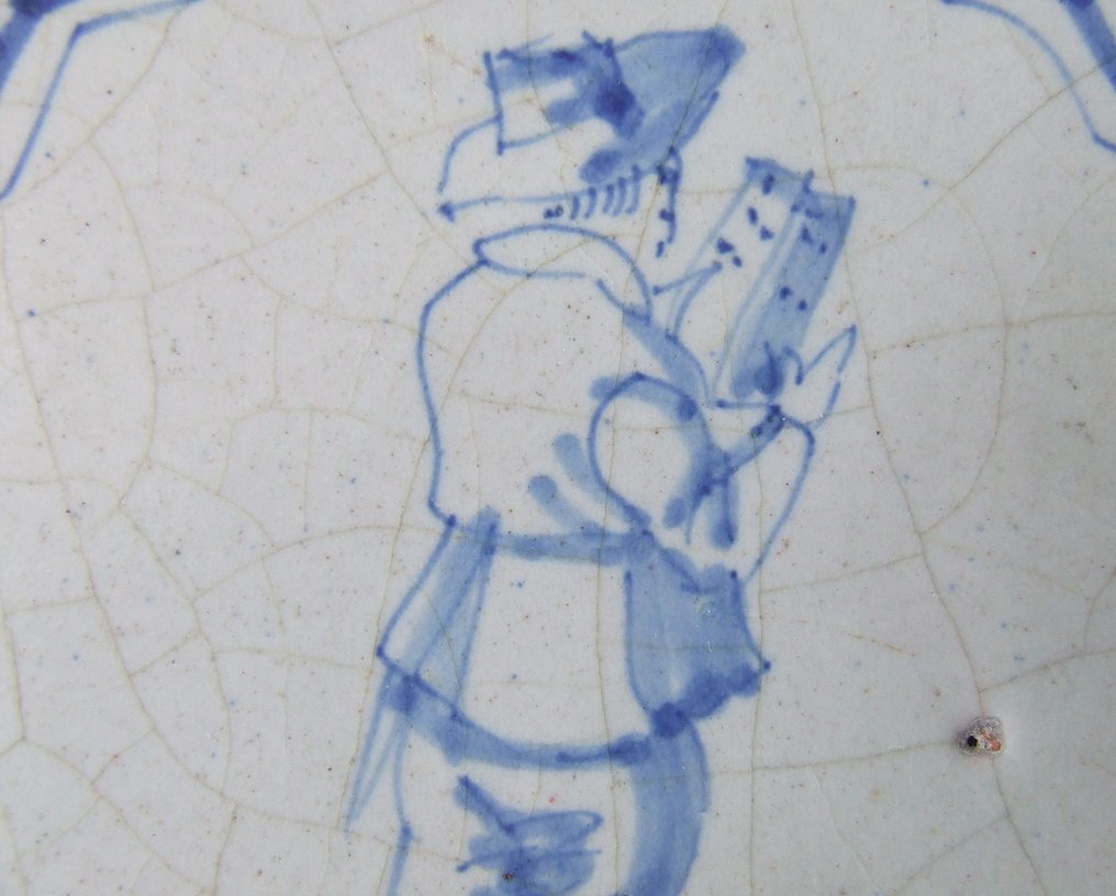  Tile - Village crier in a sculpted list. - 1600-1650  #1.0