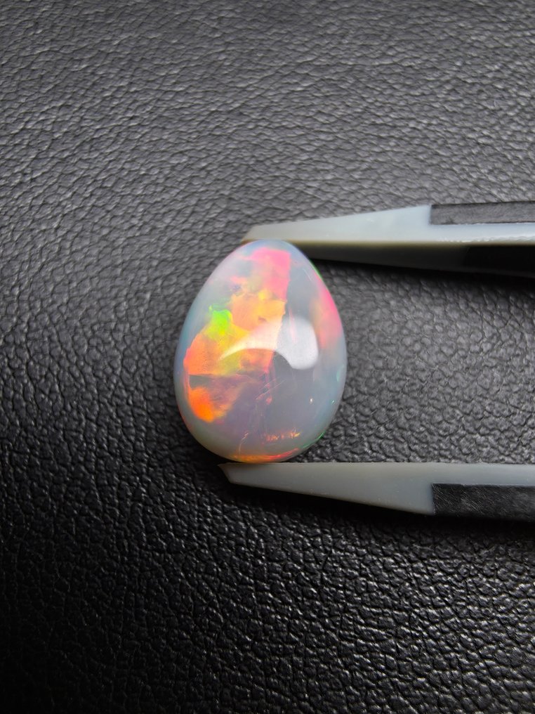 Opal natural alb de 4ct Caboșon - Înălțime: 13.1 mm - Lățime: 9.6 mm- 0.8 g #4.3