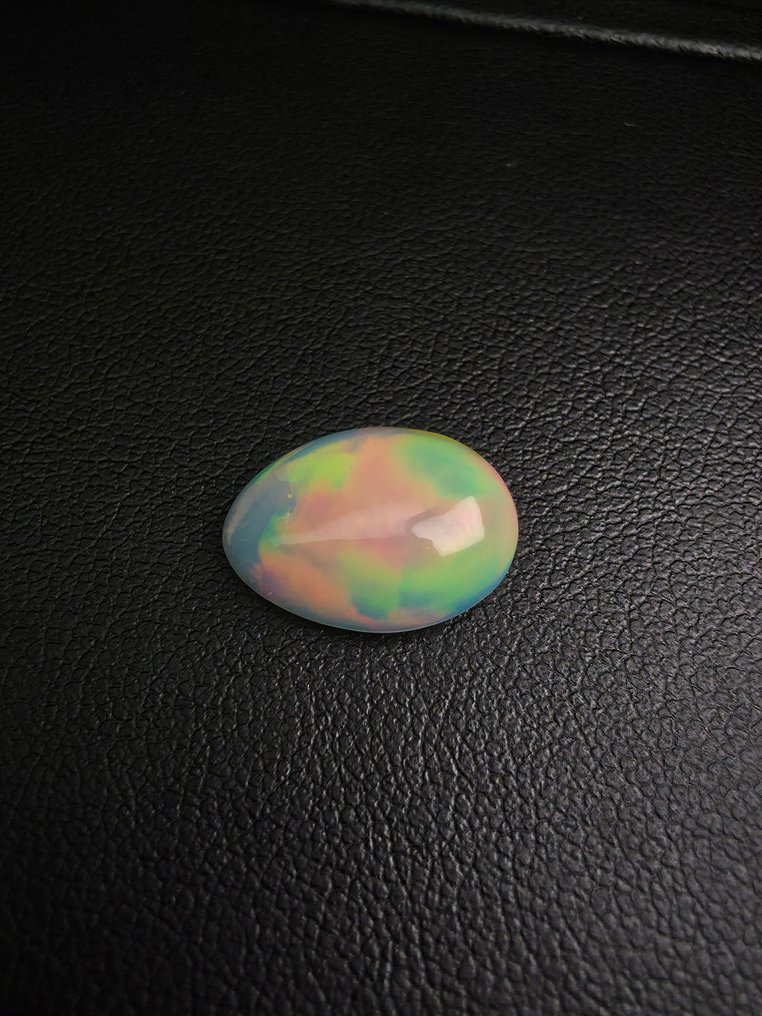 3,4 ct vita opal Cabochon - Höjd: 14.6 mm - Bredd: 10.9 mm- 0.68 g #3.2