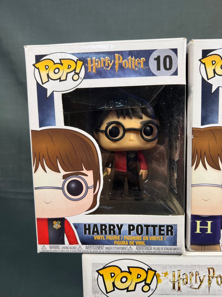 Funko  - Action figure Lotto 3 Funko Pop Harry Potter – #10 Harry, #27 Harry Sweater, #78 Rubeus Hagrid #1.0