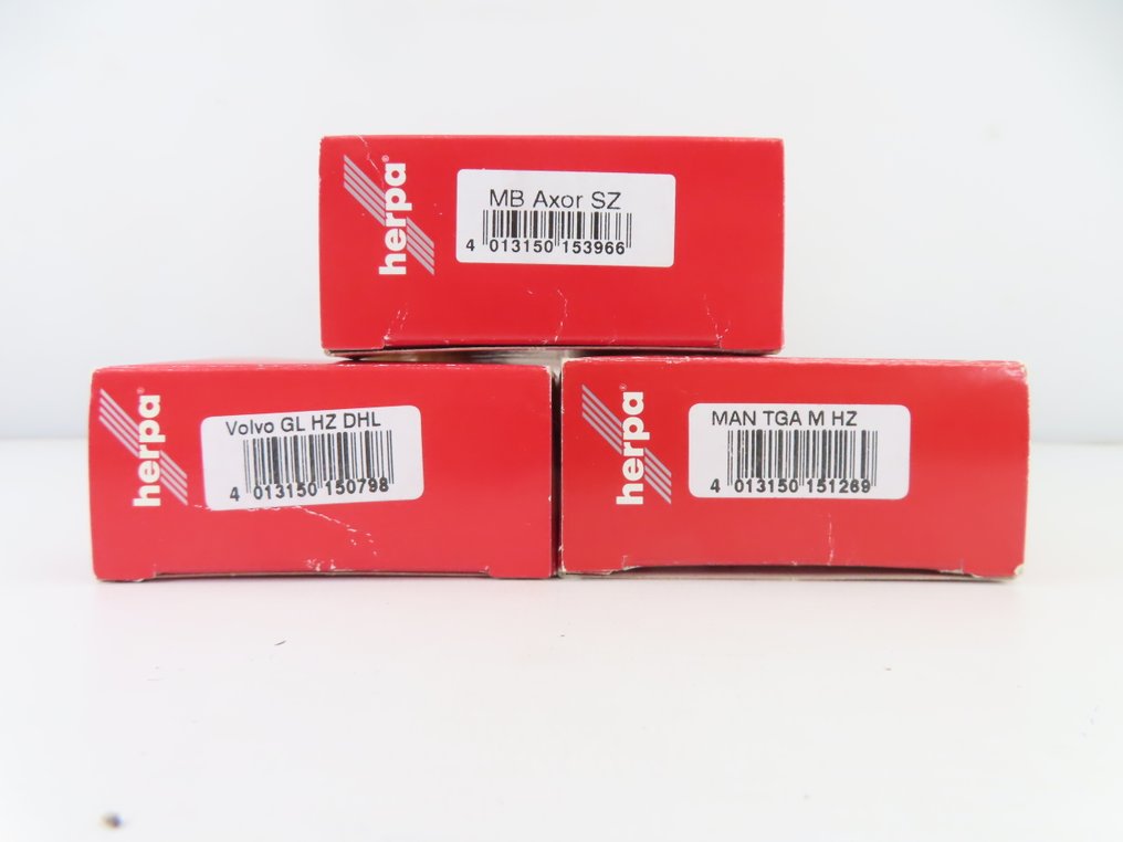 Herpa 1:87 - 150798/153966/151269 - Modele pojazdów kolejowych (3) - 3 ciężarówki z naczepami/przyczepami: DHL #4.3