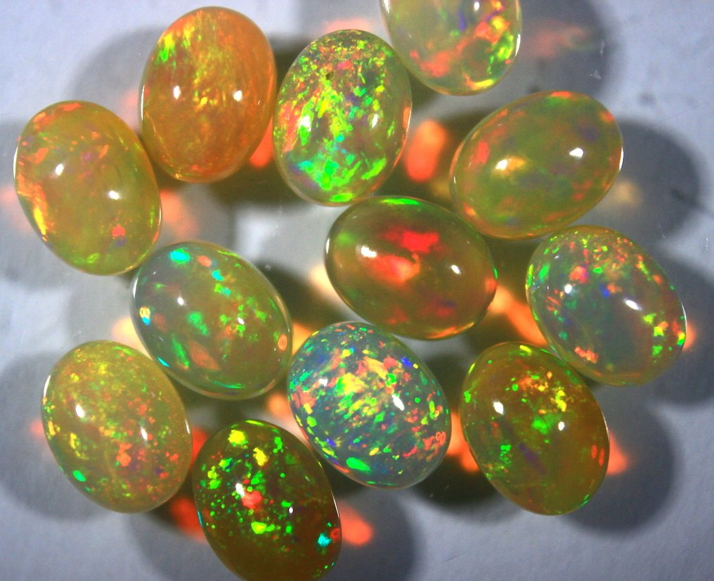 Oval Ethiopian Opal Cabochon - 10.80 Ct. Top Color Collection - Height: 8 mm - Width: 6 mm- 2.16 g #1.0