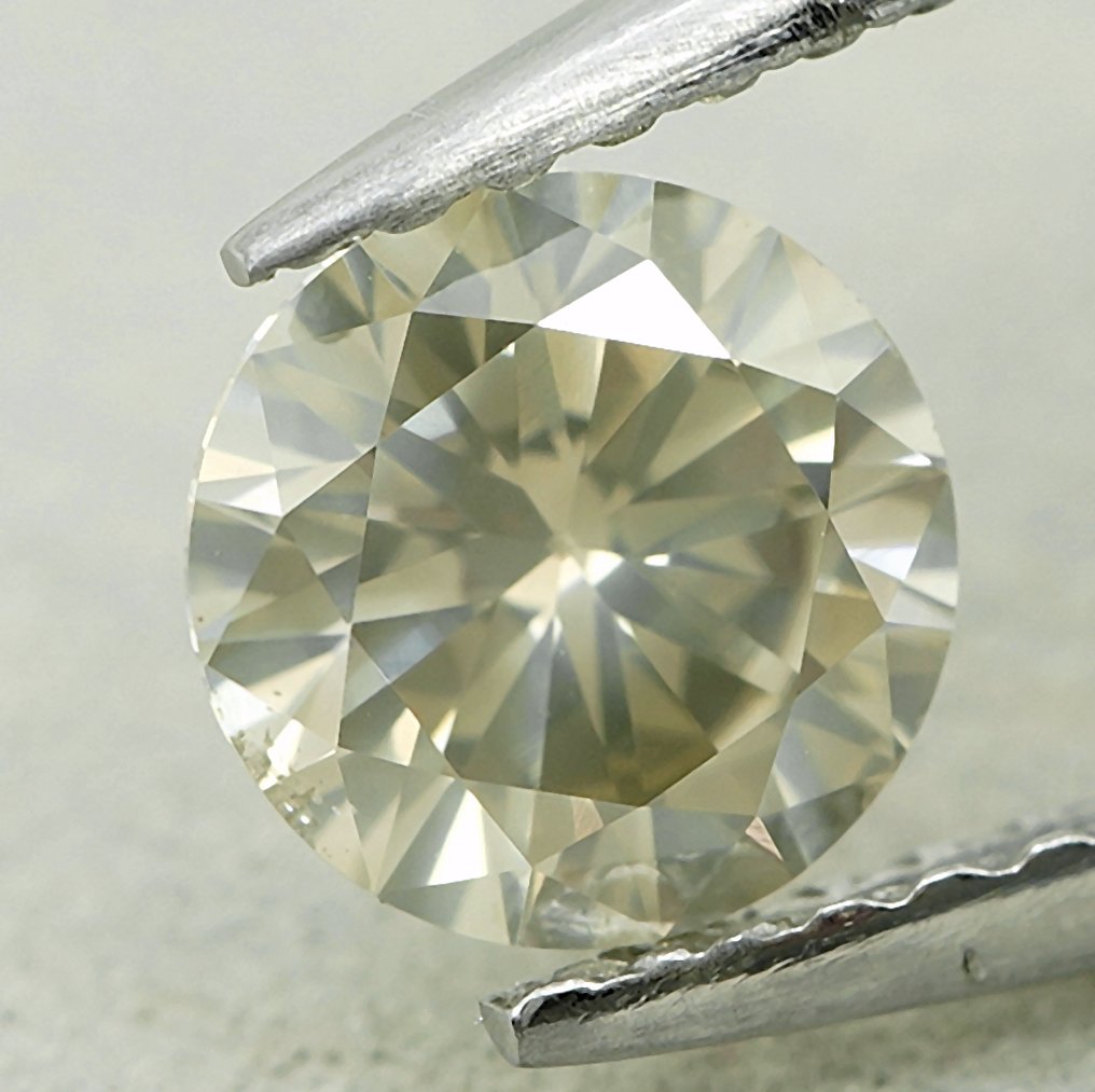 1 pcs Timantti  (Luonnonvärinen)  - 0.65 ct - Pyöreä - Faint Harmahtava Keltainen - SI2 - Jalokivitodistus, Antwerpen (GRA) #1.0