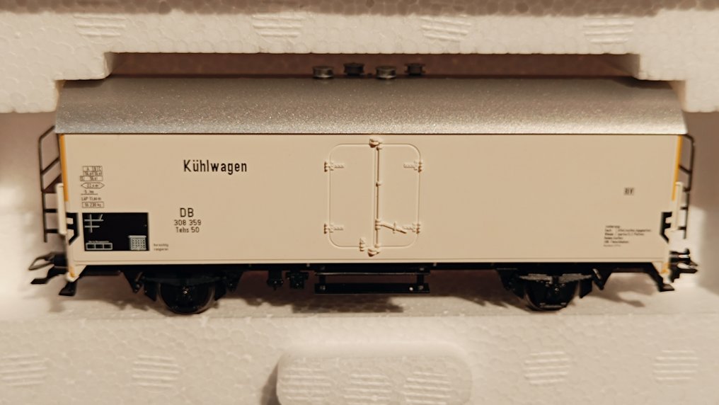 Märklin H0 - 47904 - Modeltrein goederenwagonset (1) - Set van 2 koloniale goederenwagons met zware vrachtwagen - DB #2.1