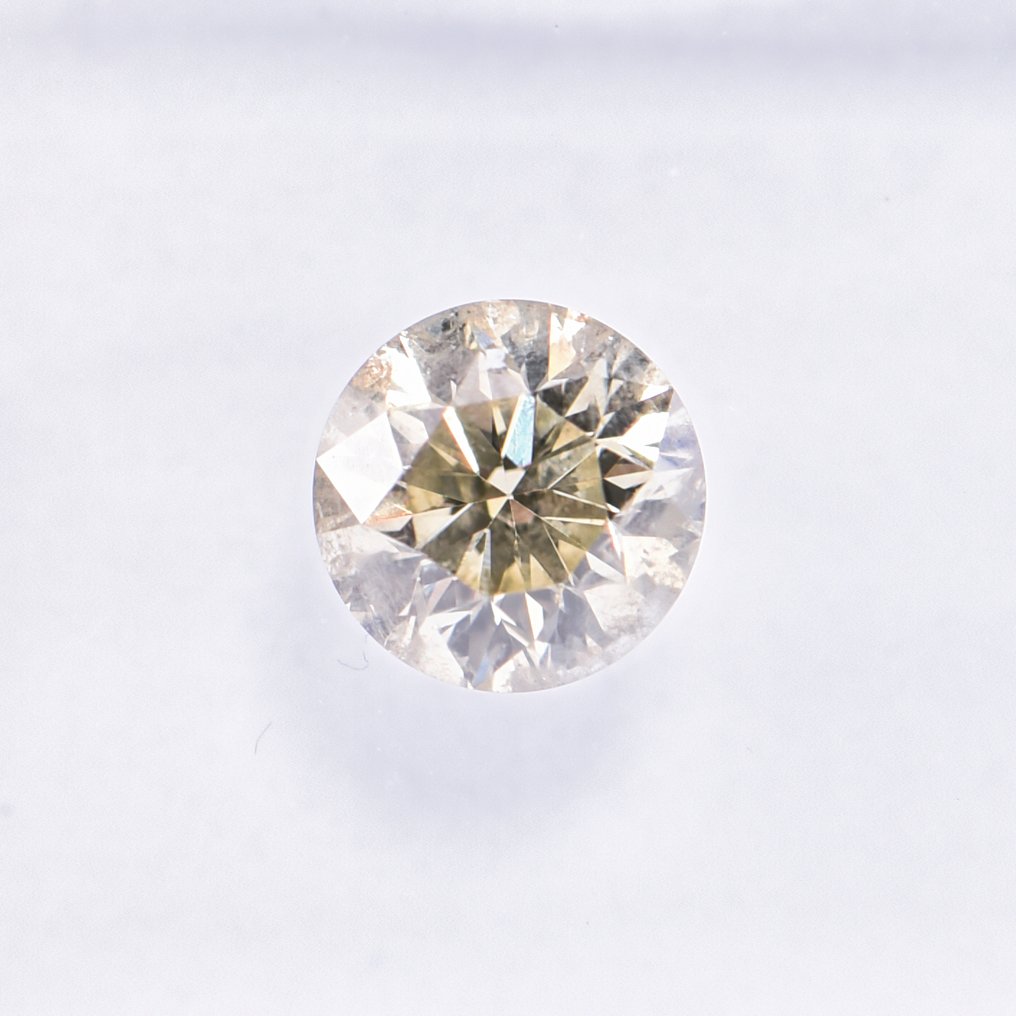 Utan reservationspris - 1 pcs Diamant  (Naturligt färgad)  - 0.56 ct - Rund - Fancy light Grönaktig Gul - I1 - International Gemological Institute (IGI) - VG VG VG #2.1