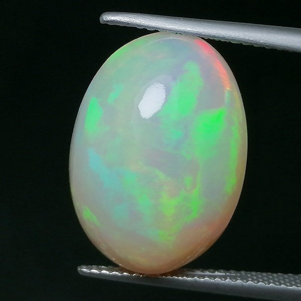 Opal  - 13.28 ct - Instituto Gemólogico Español (IGE) - Intense Color Play #3.2