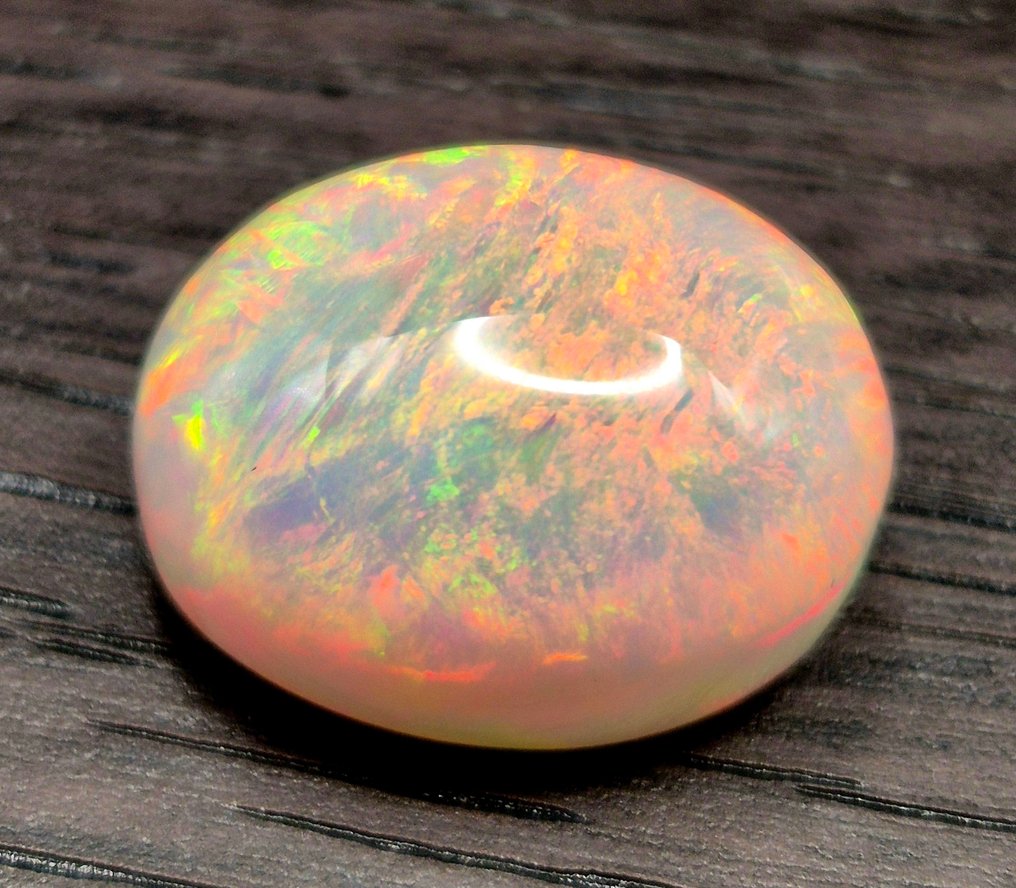 First-quality AAA+++ opal cabochon, 14.90 carats Polished - Height: 18 mm - Width: 14 mm- 2.98 g - (1) #1.0