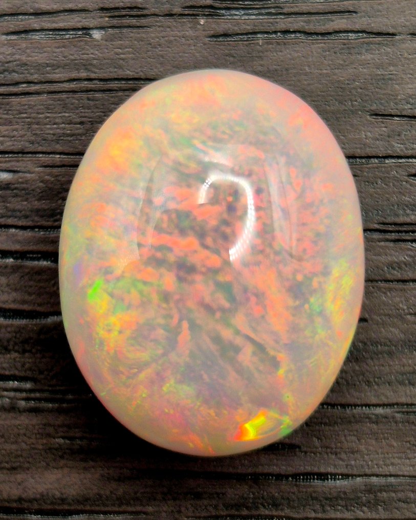 First-quality AAA+++ opal cabochon, 14.90 carats Polished - Height: 18 mm - Width: 14 mm- 2.98 g - (1) #3.2