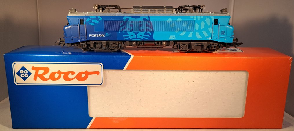 Roco H0 - 43784 - Ηλεκτροκίνητη ατμομηχανή (1) - Σειρά 1600 με διαφήμιση Postbank. - NS #1.0